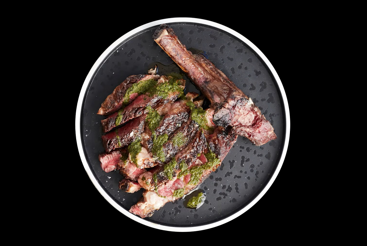 Rib Eye on the bone with Salsa Verde